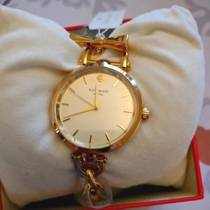Kate Spade gold bracelet watch, chain link, bow tie clasp
